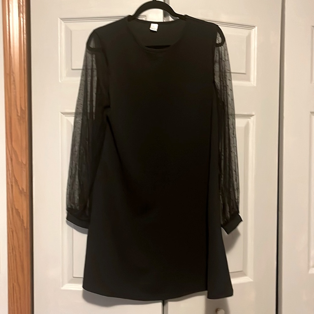 Black cocktail dress with mesh see thru sleeves